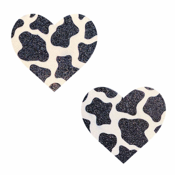 Black and white cow print glitter heart nipple pasties shown on their own