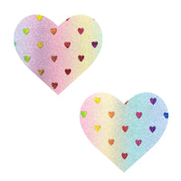 Front view of pastel multicolor holographic glitter heart nipple pasties with the full design visible