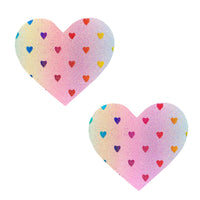 Pastel multicolor holographic glitter heart nipple pasties shown on a clean background