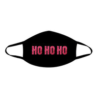 Red glitter lettering on a black face mask for a Christmas holiday party