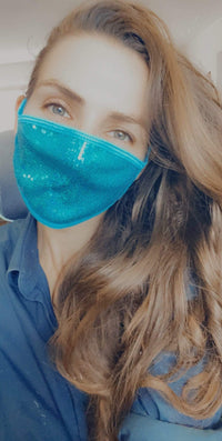 Model wearing the blue sequin sparkle face mask from the mermaid set
