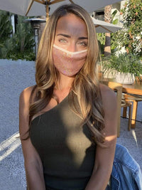 Champagne nude sequin sparkle face mask styled on a model to show fit and placement
