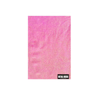 Coral pink iridescent blacklight neck gaiter shown on its own