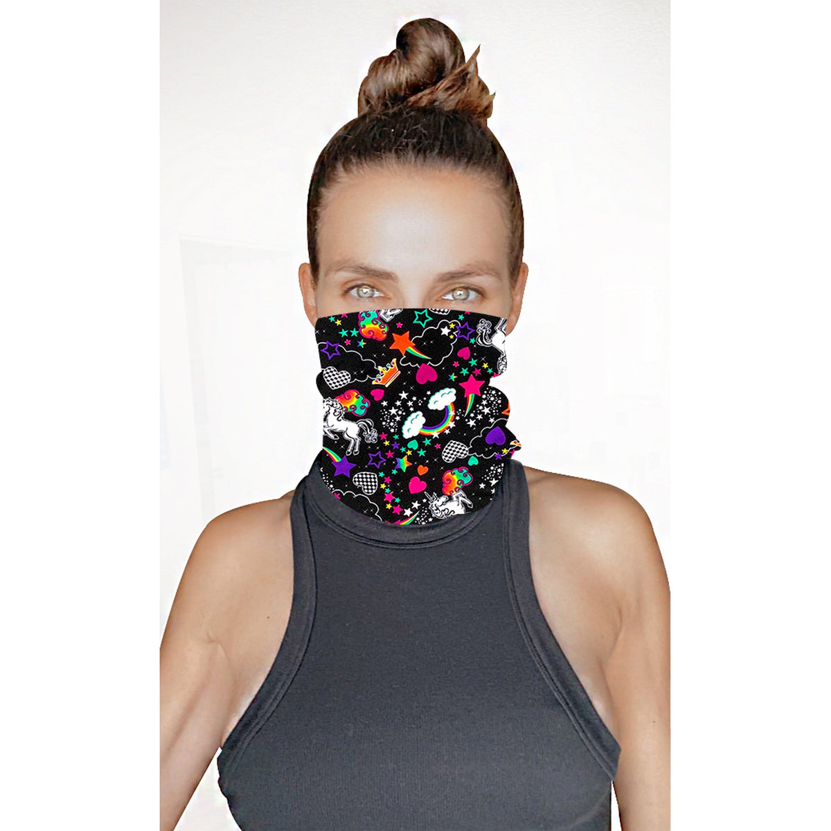 Model wearing the black neon rainbow neck gaiter pulled up as a face cover