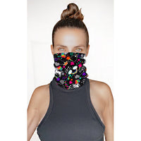 Model wearing the black neon rainbow neck gaiter pulled up as a face cover