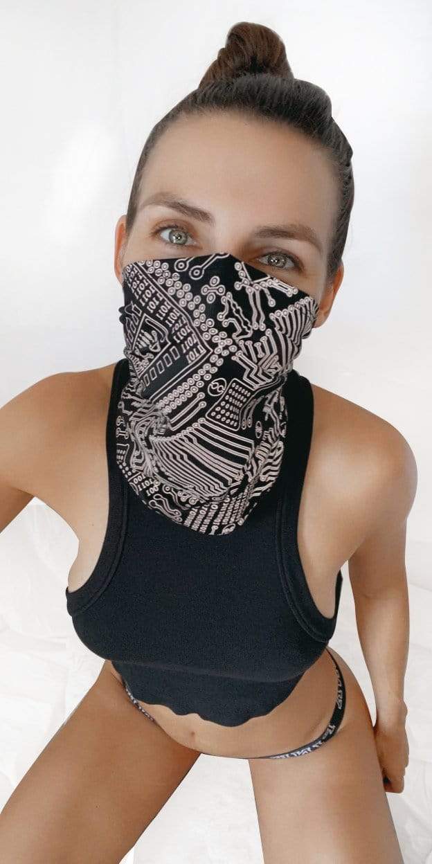 Model in the reflective black white circuit neck gaiter for a cyber look