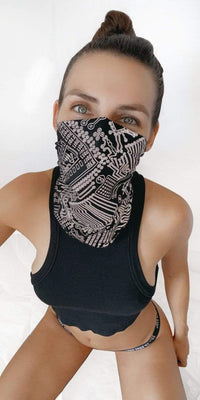 Model in the reflective black white circuit neck gaiter for a cyber look