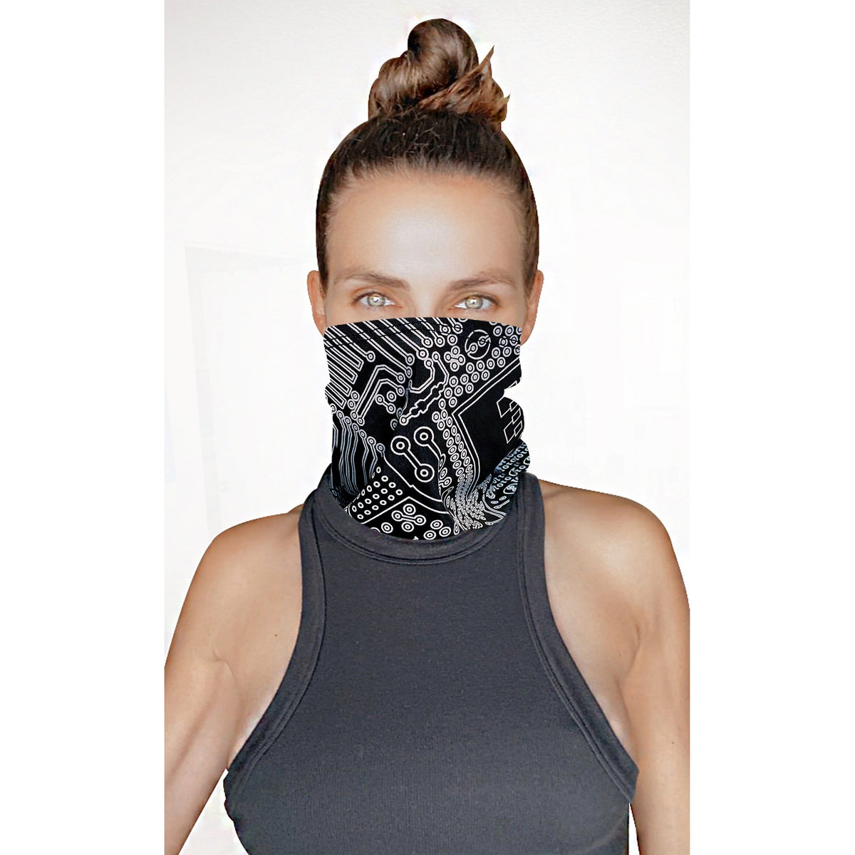 Model wearing the black white reflective circuit neck gaiter as a face cover
