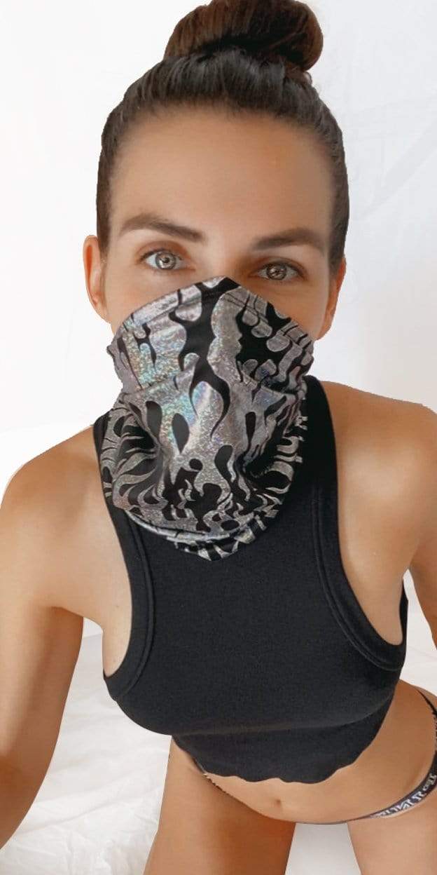 Model in the black holographic flame neck gaiter for a cyberpunk look
