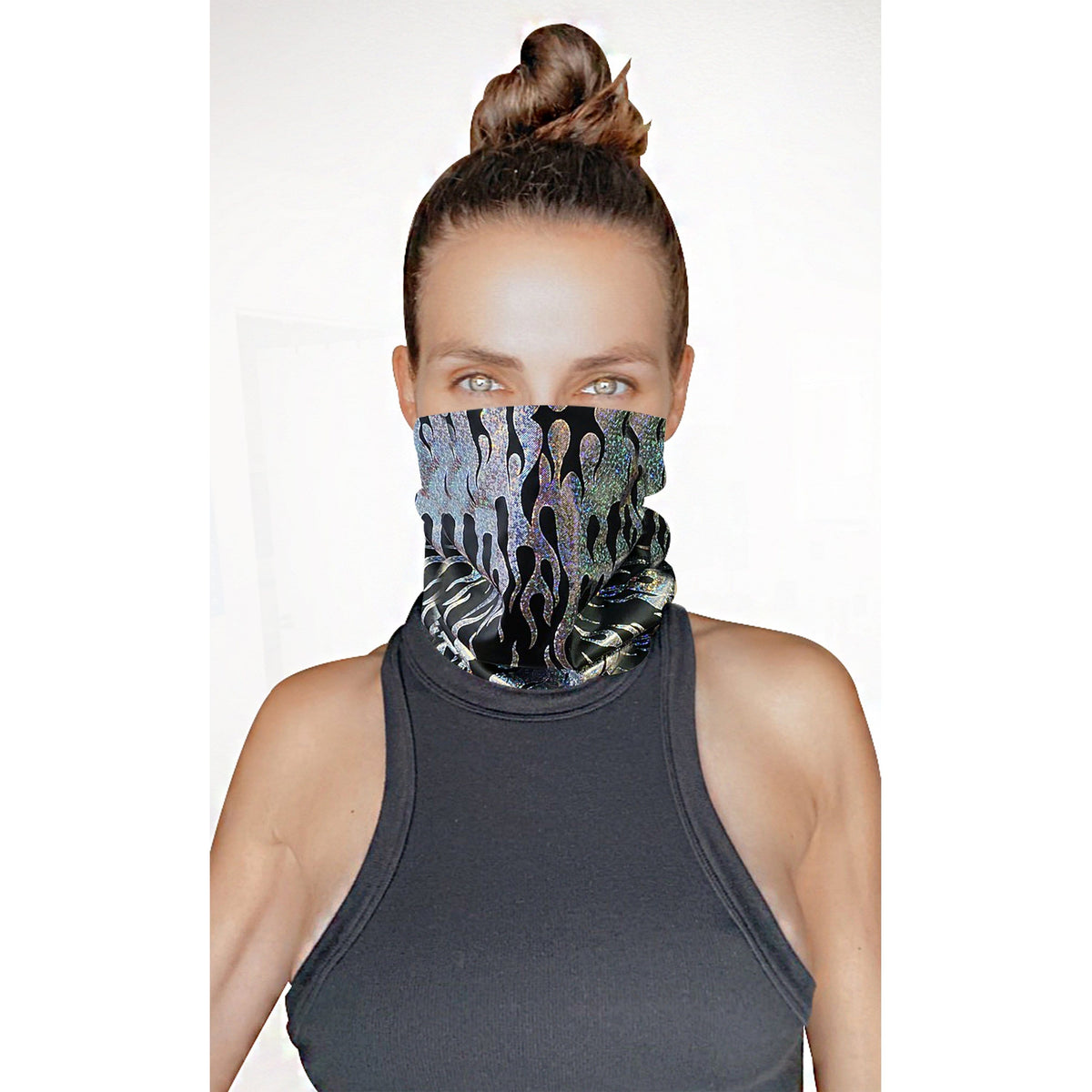 Model wearing the black holographic flame neck gaiter as a face cover