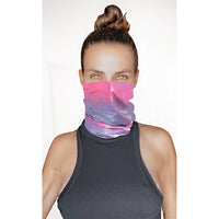 Model wearing the pink blue holographic neck gaiter as a face cover