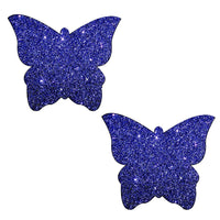 Product view of purple glitter butterfly nipple pasties highlighting the sparkling glitter finish