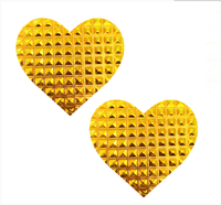 Orange iridescent chrome heart nipple pasties shown alone, in a raised 3D metallic finish
