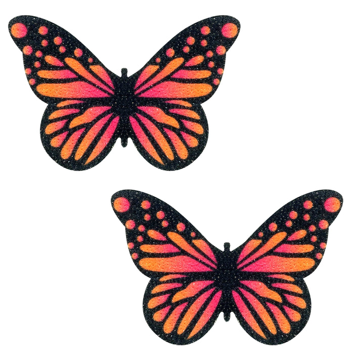 Pink and orange ombre velvet glitter butterfly pasties shown on a clean background
