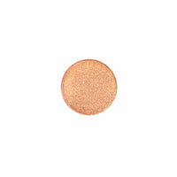 Bronze gold glitter pressed pigment eyeshadow on display, in a sunkissed shade