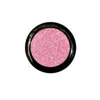 Baby pink glitter pressed pigment eyeshadow shown alone, with a sparkly glitter finish