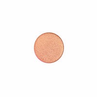 Mauve peach pressed pigment eyeshadow on display, in a smooth skin tone shade