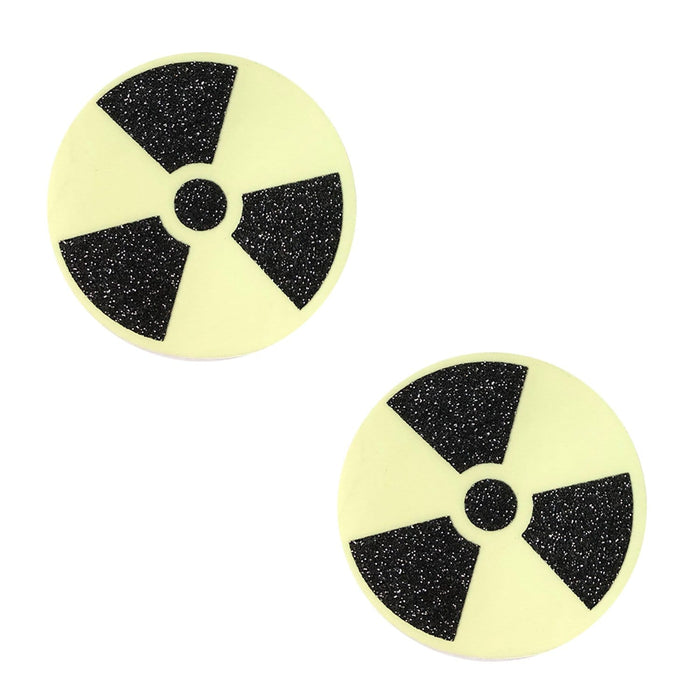 Black glitter radioactive nipple pasties with a yellow warning symbol that glows in the dark
