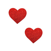 Red glitter and crystal Valentine makeup bundle pictured alone against a plain backdrop