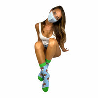 Model wearing the blue and green neon mushroom cotton novelty socks
