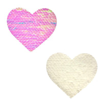 Pearl White Flip Sequin Heart Nipple Pasties shown on their own with a shimmering sequin surface