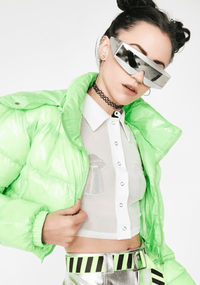 Model wearing sequin flying saucer nipple pasties with rainbow embroidery, shown on the body