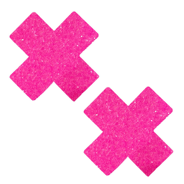Hot pink blacklight chunky glitter X nipple pasties shown on a clean background