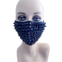Black spiked stud face mask shown on its own, a bold goth rave accessory