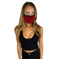 Model wearing the red studded face mask with spikes for a vampire night