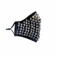 Side view of the silver chrome studded face mask with shiny spikes