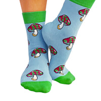 Pair of blue green neon mushroom cotton socks with a psychedelic vibe
