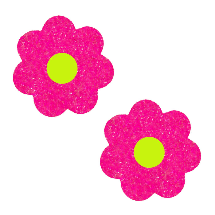 Hot pink blacklight glitter flower petal nipple pasties shown on a clean background